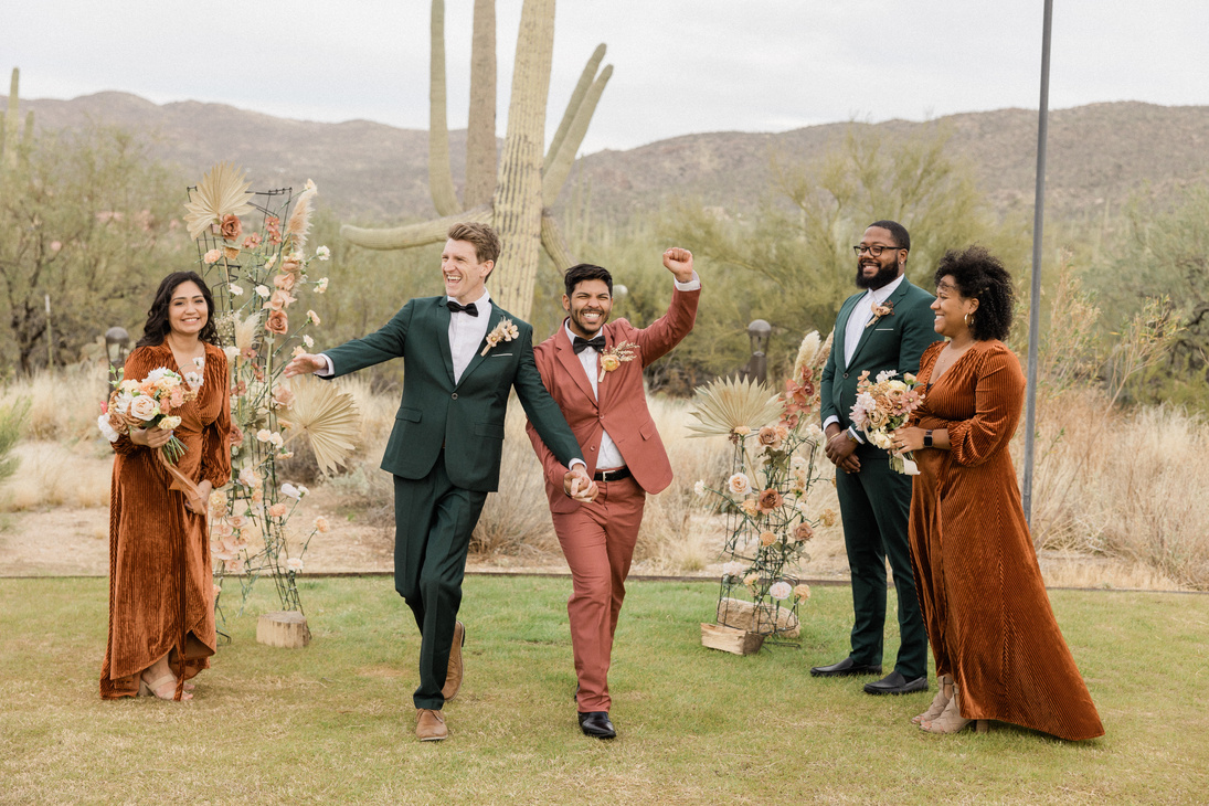 Newlywed Couple at Outdoor Rustic Wedding with Guests